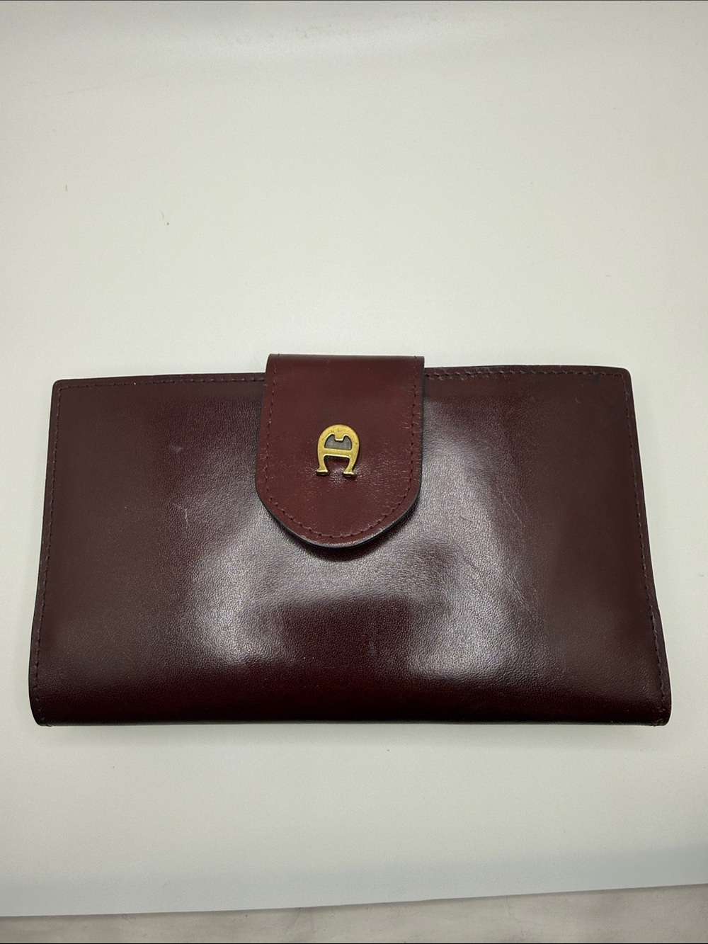 Vintage Etienne Aigner burgundy leather wallet